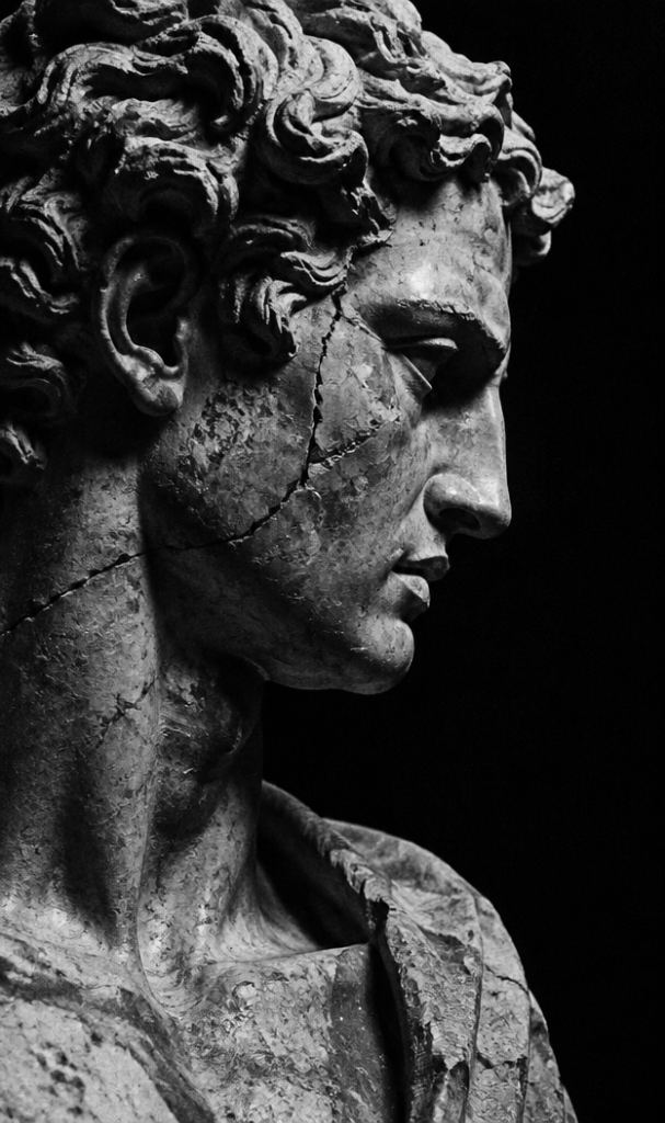 Marble bust with a crack across the face